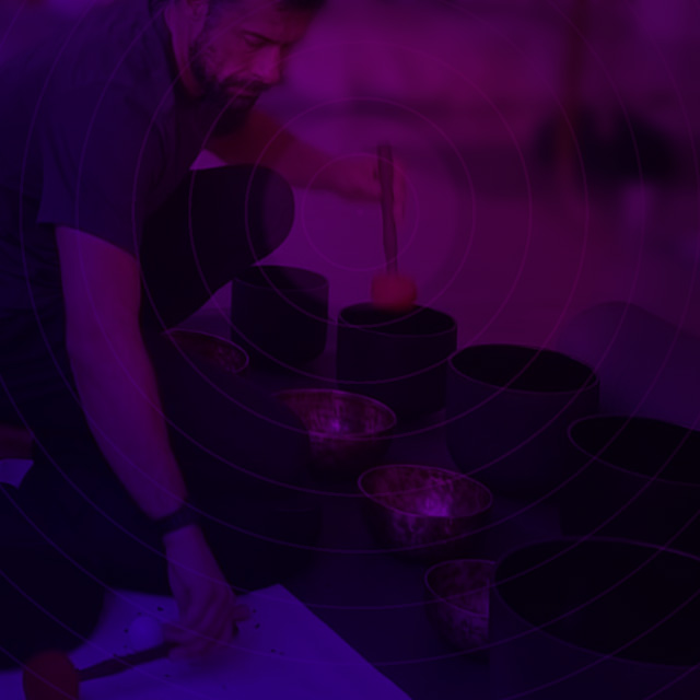 Gavin preparing instruments for a soundbath